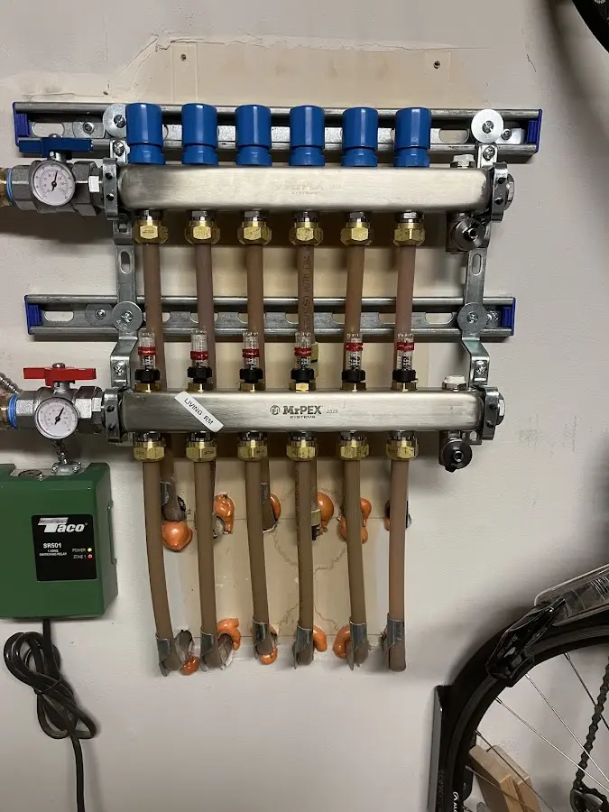 Plumber performing Gas Line Installation at a residential property in Montcalm